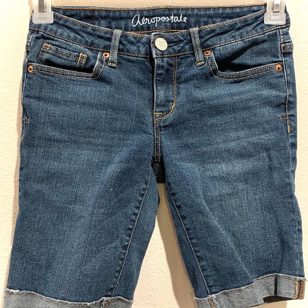 Blue jean shorts, modest, above-the-knee length